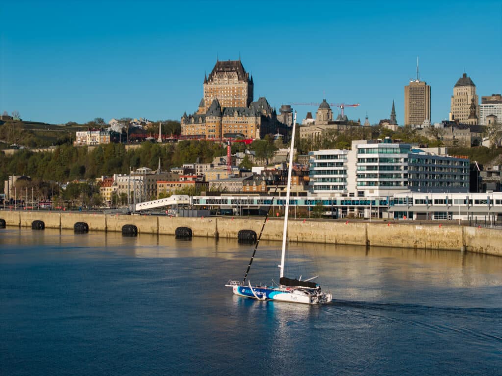 Emira IV against a backdrop of Quebec City