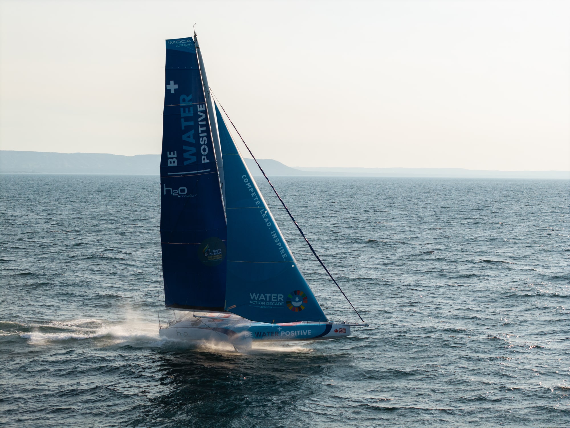 60 foot sailing boat in lake on foils